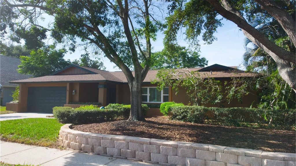 Photo of 1656 Brae Moor Lane, Dunedin, FL 34698 (MLS # TB8501959)