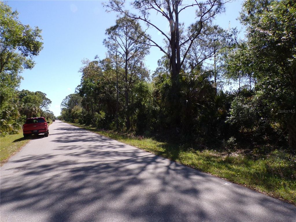 Photo of 12115 Estrella Boulevard, Punta Gorda, FL 33955 (MLS # C7507293)