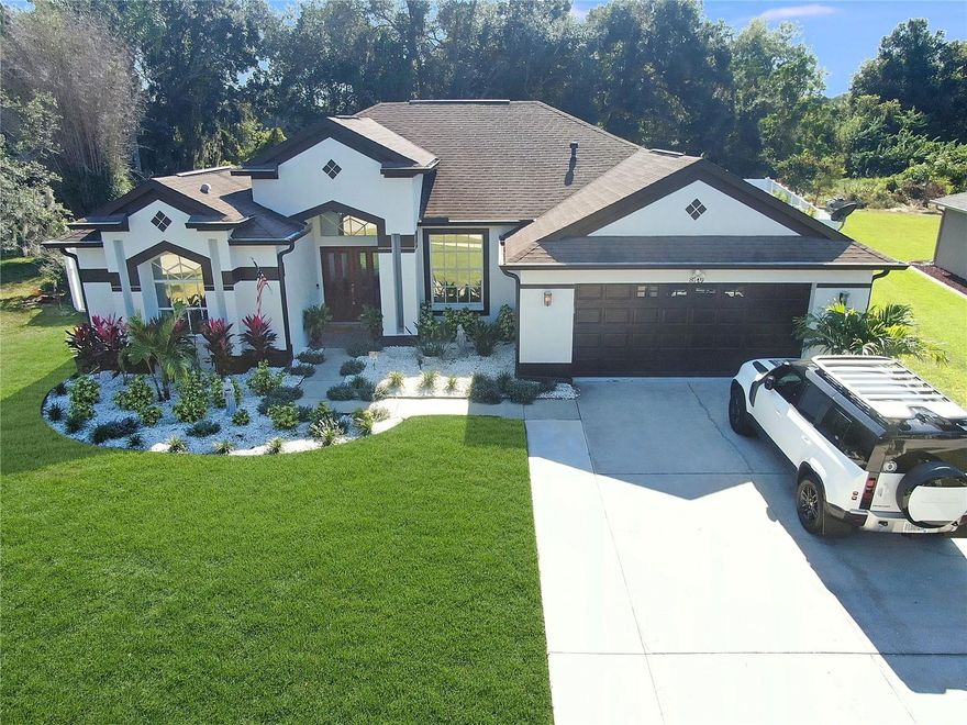 This captivating home nestled against a serene nature preserve offers an unparalleled living experience. With $90,000 worth of upgrades since its last purchase, it exudes luxury and sophistication. The exterior has been transformed with all-new landscaping, lush sod, and an efficient irrigation system. Step into the backyard, and you'll be greeted by a magnificent saltwater pool, recently enhanced with a new pump, heater, and filter. The screened-in pool area provides a tranquil oasis, perfect for relaxation, while the 15x10 full outdoor kitchen allows for delightful culinary adventures. The addition of a new 6 ft vinyl fence ensures privacy, and an oversized shed offers ample storage space.

Inside, the home exudes a sense of spaciousness and openness with its well-designed open concept kitchen/living area. The kitchen is a chef's dream, featuring 42" shaker cabinets, exquisite Quartz countertops and island, brand-new stainless-steel appliances, a double oven, and a restaurant-grade faucet. Adjacent to the kitchen is a convenient inside laundry room that leads to the double car garage.

The split floor plan creates a private oasis in the incredible master suite. It boasts a luxurious private bathroom complete with twin sinks, a high-end walk-in shower, a private toilet, and a relaxing soaker tub. Sliding doors lead from three rooms to the inviting back pool area, allowing for seamless indoor-outdoor living. Additionally, the second bathroom is conveniently accessible from the back porch, eliminating the need to traverse the house when coming in from the pool.

This home is equipped with modern conveniences, including ceiling fans throughout, vaulted ceilings, a formal dining room, walk-in closets, a video monitoring system, and a Ring doorbell. The seller is highly motivated, presenting an excellent opportunity to make this dream home yours. Don't wait to experience the epitome of luxury living in this remarkable property.