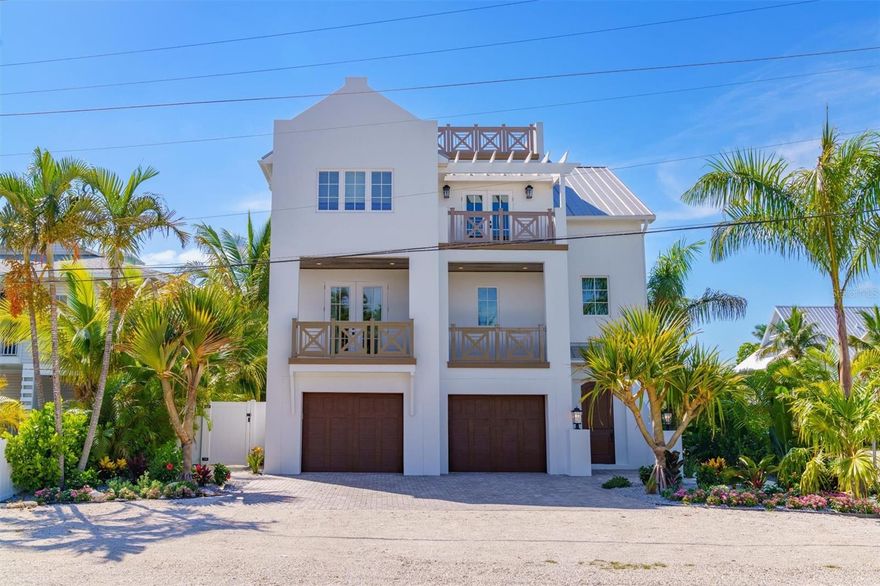 Brand new construction north of Pine Avenue.  Custom Built Cape Dutch home designed by Beacon Construction, finishes selected by Emily Moss Design and built by Buky Construction.  Open floor plan designed for entertaining, gourmet kitchen, large master suite with built in closets and secondary laundry.  Separate guest suite with a private garage.  Large pool and fenced in backyard surrounded by lush landscaping. This is a perfect home for the most discriminating Buyer.  Roof top deck with sunset and Tampa Bay views.  Walking distance to beaches, Pine Avenue shops and boutiques and the city Pier.