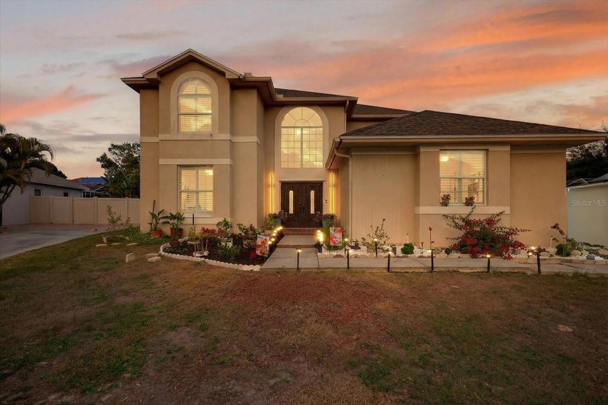 Welcome to this stunning luxury residence, designed to impress in every detail. This 4-bedroom, 3.5-bathroom home with a two-car garage offers exceptional craftsmanship, modern elegance, and thoughtful design throughout. Upon entering, you'll be greeted by soaring ceilings and elegant porcelain tile flooring, creating a bright and exquisite ambiance. The open-concept layout seamlessly connects the living room and kitchen. The gourmet kitchen is a chef's dream, featuring quartz countertops, solid wood cabinetry, stainless steel appliances, a wine cooler, and a wall oven with an integrated microwave—perfect for everyday living and entertaining. A dedicated wine cellar adds a touch of luxury and sophistication beneath a stunning staircase. Designed for comfort and flexibility, the first floor includes a bedroom and full bathroom, ideal for guests or multi-generational living, as well as a half bathroom with direct access to the pool area. Step outside to your private oasis: a covered patio with a sparkling pool and heated spa, and a fully fenced yard, perfect for year-round enjoyment. Upstairs, you'll find the primary suite, a true retreat with walk-in closets, a dressing area, and a gorgeous spa-like bathroom designed for relaxation and luxury. Two additional generously sized bedrooms upstairs share a Jack-and-Jill bathroom. This home offers the perfect balance of privacy, comfort, and luxurious living. This exceptional property is the epitome of modern luxury, featuring a new roof, new air conditioning units, a new water heater, a new pool pump, and fresh interior paint. For those concerned about storage, the garage includes a custom-built storage loft, ensuring ample space for your belongings. Schedule your private showing today and experience it for yourself.