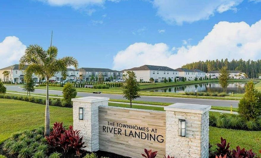 Welcome to Townhomes at River Landing, an upscale Taylor Morrison community offering resort-style living in the heart of Wesley Chapel. This beautifully designed Jasmine floor plan features three spacious bedrooms, two and a half baths, a one-car garage, and a two-car driveway. The charming front porch invites you into an open-concept great room that seamlessly connects the living and dining areas to a gourmet kitchen, perfect for entertaining. The kitchen is equipped with upscale stainless steel appliances, pretty grey cabinetry, elegant quartz countertops, an oversized island, a walk-in pantry, and elegant grey tile flooring throughout the downstairs. Enjoy added convenience with a powder room, under-stair storage, and large sliding glass doors that open to a private patio and yard, ideal for soaking in the fresh air and tranquility of swaying palm trees with no rear neighbors. Upstairs, you’ll find three generously sized bedrooms and two full baths. The luxurious primary suite boasts a walk-in closet and an elegant ensuite bathroom featuring dual sinks and a glass-enclosed walk-in shower. The second and third bedrooms, located on the opposite end of the hallway for privacy, share a stylish bathroom with a soaking tub and shower combo. A large linen closet and a separate laundry closet with a brand-new washer, dryer, and additional storage complete the upper level. Life at River Landing means access to a sparkling new pool, a summer kitchen with BBQs, shaded pergolas and cabanas, restrooms, scenic nature trails, a dog park, sports field, and a playground—all included with low monthly HOA dues that also cover lawn care, irrigation, recycling, trash pick-up, and maintenance of all common areas. This is the only townhome in this sold-out community with no rear neighbors—enjoy added privacy and a peaceful setting! Ideally located just off SR56 near Morris Bridge Road, you’re minutes from Wiregrass Mall, Tampa Premium Outlets, top-rated schools, excellent healthcare, movie theaters, entertainment options, and a wide range of dining from casual to upscale. With easy access to I-75 and I-275, commuting is a breeze. Don’t miss the opportunity to make this exceptional home yours—schedule your private viewing today!!