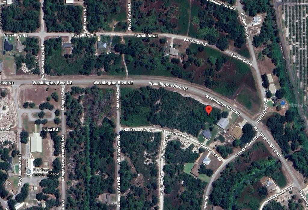 Photo of 803 Washington Boulevard NE, Lake Placid, FL 33852 (MLS # OK225678)