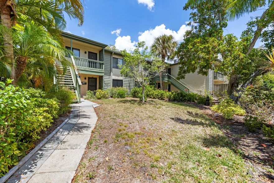 Welcome to the amazing tropical paradise Pelican Cove and all it has to offer.  Private peaceful water views from your own private deck and a front outside courtyard make this spot desirable.  Each unit comes with a covered carport and there is plenty of visitor parking as well. Pelican Cove is a 75-Acre gated community along Little Sarasota Bay in Sarasota and you really feel immersed in the Tropical gardens. This pet-friendly community also has boat slips, fishing dock, kayak/canoe launch & storage, and direct access to the Intracoastal Waterway leading you out to the Gulf. You will never get bored here in Pelican Cove with the community offering 3 clubhouses, 6 heated swimming pools, a hot tub, an exercise room, tennis courts, pickleball courts, a basketball court, shuffleboard, walking trail, and a dog run. They also have plenty of social gatherings & planned activities too. Pelican Cove is a 24-Hour gated community with a security guard. Located just minutes from shopping, restaurants, medical centers and Siesta Key Beach.