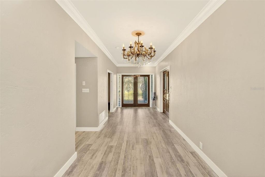 Photo of 1725 Long Bow Lane, Clearwater, FL 33764 (MLS # TB8483655)