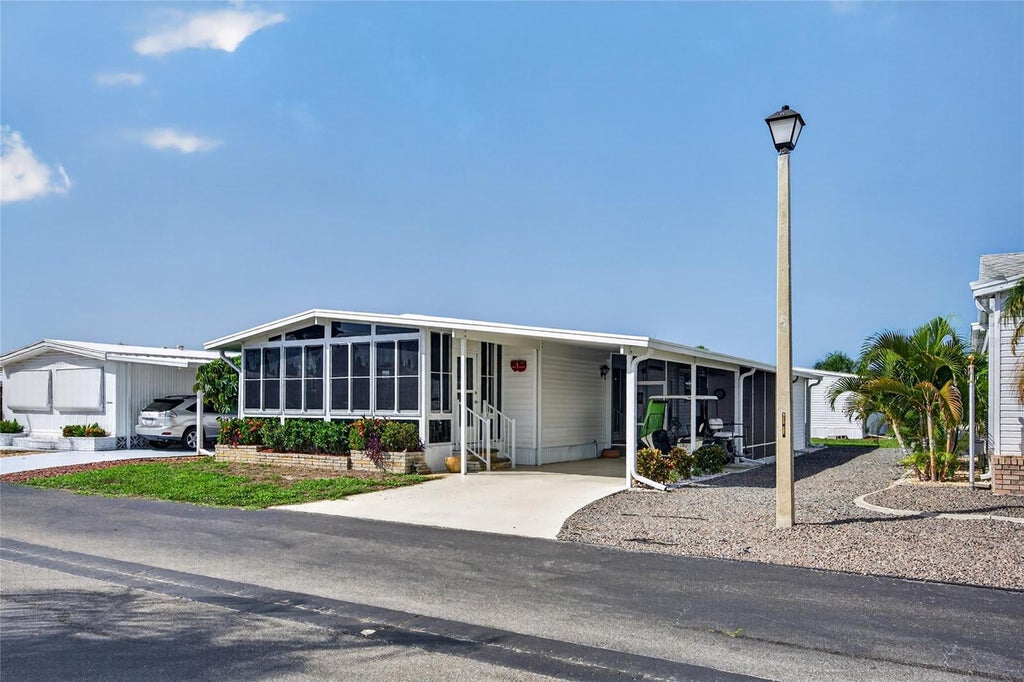 Photo of 11 Del Prado Drive, Englewood, FL 34223 (MLS # N6145386)