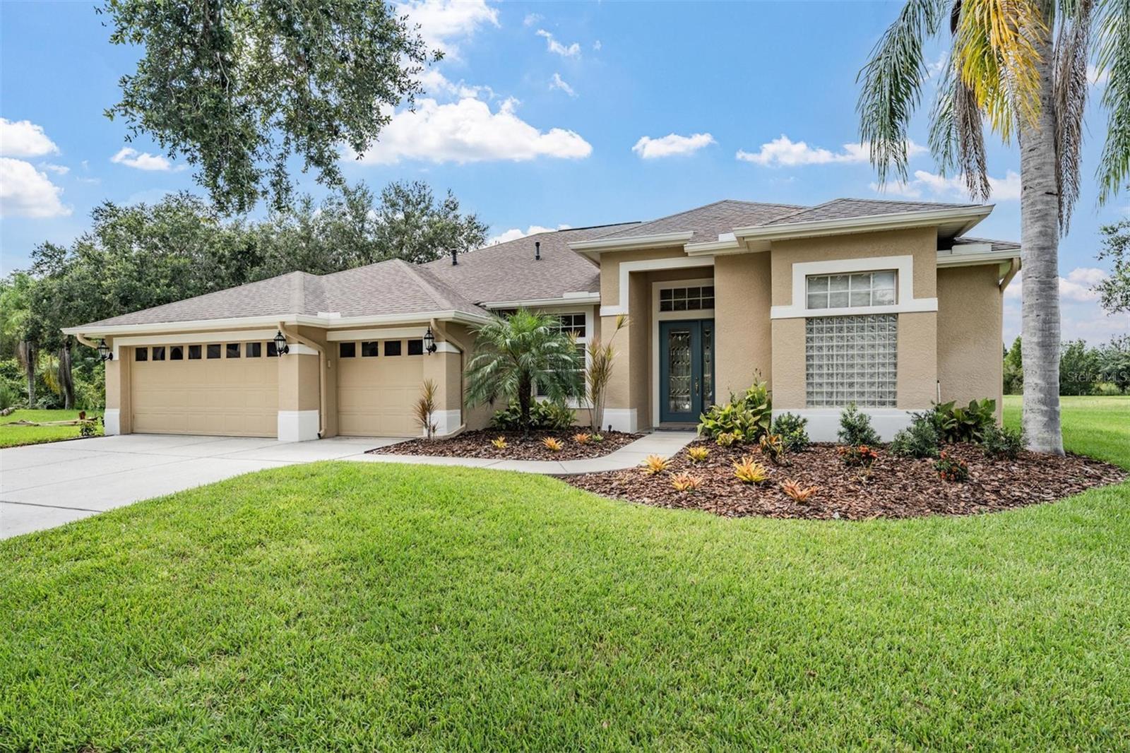 Located in the gated enclave of Strathmoor Estates within West Meadows, you'll find this beautifully updated 4 bedroom, 3 bath pool home with a dedicated office and a spacious 3 car garage, all set on an oversized conservation lot with tranquil pond views. Tucked at the end of a quiet cul-de-sac, the property offers rare privacy and a true sense of escape, with no rear neighbors. Inside, the layout is as functional as it is inviting. The kitchen was fully renovated in 2022, featuring quartz countertops, a reimagined single level island with new sink and disposal, tile backsplash, and updated pendant, recessed, and under cabinet lighting. The primary suite is a true retreat with serene conservation views, lanai and pool access, dual walk-in closets outfitted with custom organizers, and a beautifully remodeled en suite bath featuring modern finishes, walk in shower, soaking tub, and updated vanities. Fresh interior paint throughout the main living areas in 2025 gives the home a clean, modern feel. The screened lanai and pool area were extensively upgraded in 2024 with resurfaced gunite, new tile, lighting, heater, and a freshly painted deck, creating a private outdoor retreat surrounded by nothing but nature. Major mechanical upgrades include a new A/C (2021), along with a new pool pump and filter. West Meadows offers resort style amenities including a heated lap pool, family pool with water slide and splash pad, lighted tennis courts, newly added pickleball courts, basketball and volleyball courts, soccer fields, walking trails, playgrounds, and fitness center. With its serene setting, thoughtful improvements, and ideal layout, this home delivers the lifestyle today’s buyer is looking for in comfort, space, and a connection to nature, all minutes from top-rated schools, shopping, and commuter routes.