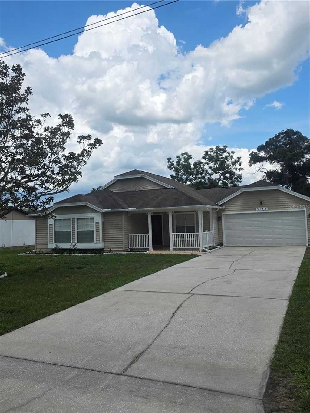 Photo of 3158 Ambassador Avenue, Spring Hill, FL 34609 (MLS # TB8510770)