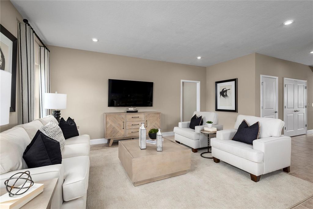 Photo of 378 Hammock Oaks Boulevard, Lady Lake, FL 32159 (MLS # W7884444)