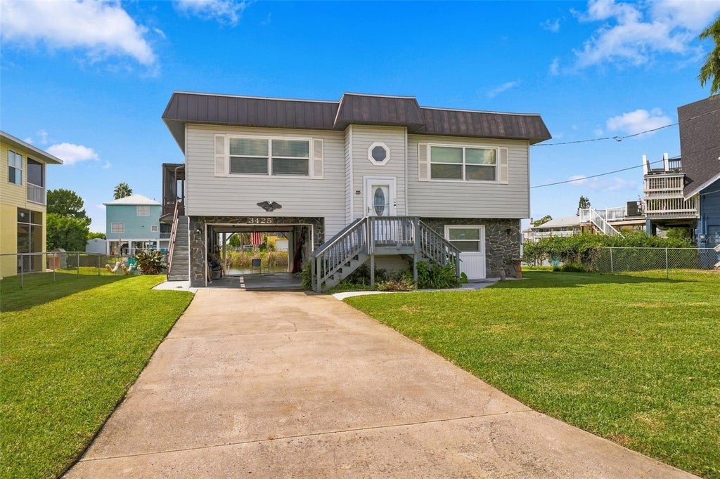 Photo of 3425 Crape Myrtle Drive, Hernando Beach, FL 34607 (MLS # W7890241)