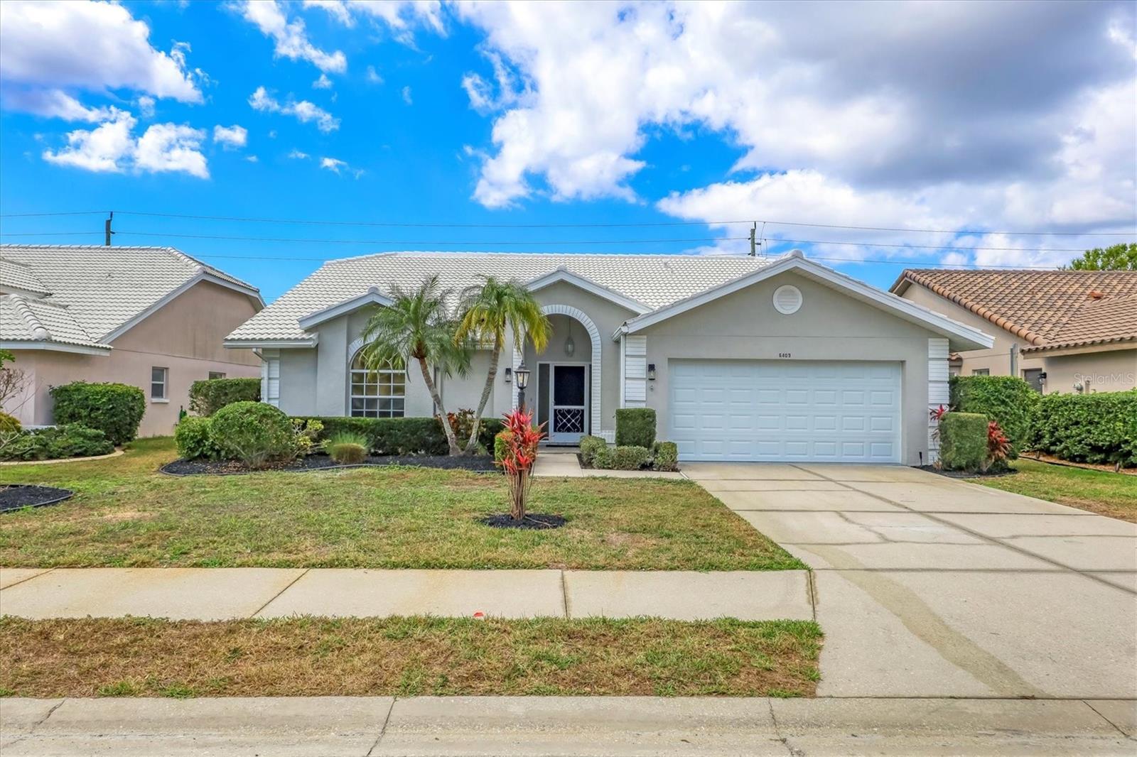 Huge Price Improvement! Bring offers, Owner Financing available for qualified buyers. This beautifully updated block home is located in the pristine championship golf course community of Tara GCC. This gorgeous move in ready home boasts a perfect blend of modern elegance and classic charm with a newer roof and AC (2021), you will enjoy peace of mind and comfort year-round. Step inside to discover this beautiful 3B/3B home featuring both tile and stunning new LV flooring that flows seamlessly throughout the open-concept living space with high elevated ceilings. The heart of the home is the gourmet kitchen, complete with brand-new stainless-steel appliances, sleek new quartz countertops, and stylish real wood cabinetry that offers ample storage with soft close doors and drawers. Whether you're a culinary enthusiast or simply love to entertain, this kitchen is sure to impress! Retreat to the luxurious designer bathrooms, meticulously renovated to provide a spa-like experience. Every detail has been thoughtfully considered, from the modern new fixtures to the elegant custom tile work. Outside, the newly screened and paver patio invites you to relax and unwind in your private outdoor oasis, perfect for gatherings or quiet evenings under the stars. The two-car garage has new epoxy floor covering and newer hot water heater (2021) with side door access. This home is located in the Tara Golf and Country Club. Golf, Tennis, Pickle Ball, (new racquet facility going in this year with 5 new pickle ball courts,) Full Fitness Center, Bocce courts, and an active Clubhouse that has daily events, dining and the most wonderful friends you will ever meet. Best location, close to shopping, dining, highways, airports and the best beaches in Sarasota/ Bradenton area. This home is not just a place to live; it's a lifestyle.