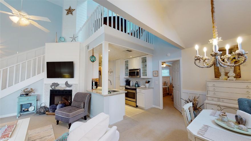 Gorgeous FROM ceiling to floor, nothing in this unit has been overlooked. Located beachside in NSB this 2 bedroom, 2 bathroom has so much to offer and even has a ocean view from the master bedroom. The unit offers vaulted ceiling, skylights, stainless steel appliances, granite counter tops, fireplace, with an front entry balcony and to top it all off it is being sold furnished! Directly across A1A you have a short walk over to the public beach access.   The HOA fee covers the building insurance, common areas, basic cable & internet, & pool.  Call and schedule your showing TODAY! All measurements should be verified for accuracy. ;Water: City