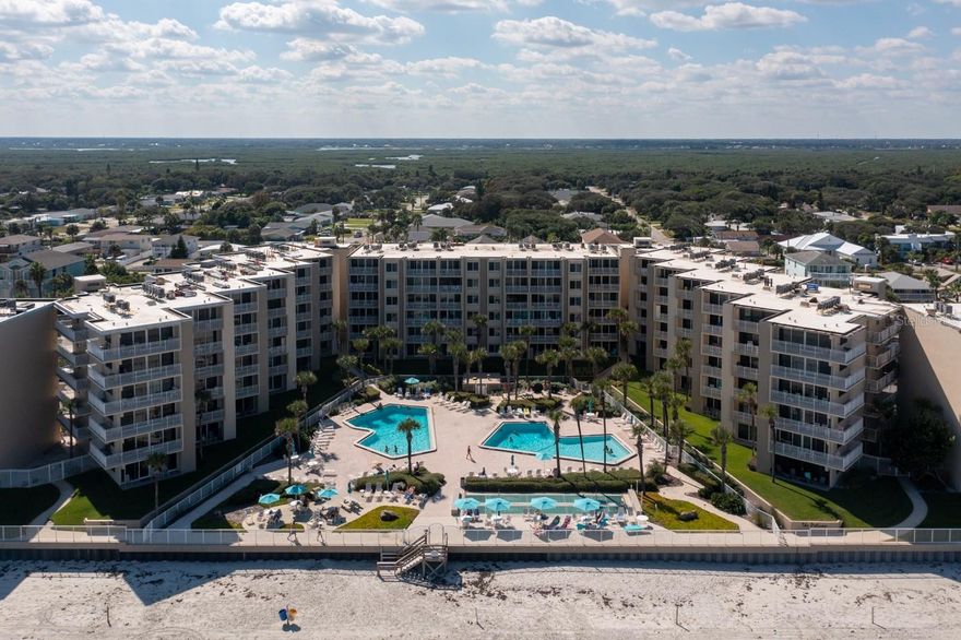 ONCE IN A LIFETIME OPPORTUNITY! This is your chance to own a very rare piece of real estate on the Atlantic Coastline in New Smyrna Beach. This updated, sprawling 3 bedroom, 3 bathroom condo feels like home & has been Immaculately maintained! Infused with plenty of natural light & a triumph of quality. Located on the 5th floor with incredible unobstructed ocean views. Amazing sunrises right from your private balcony or Master suite! Very spacious bedrooms & closets. 2 Oceanfront Pools with a large patio for entertaining. Pride of ownership is evident throughout this complex! This condo comes fully furnished & is turnkey. This property makes a great rental/investment property. Short walking distance to shopping, dining, and everything wonderful New Smyrna Beach has to offer! ;Water: City
