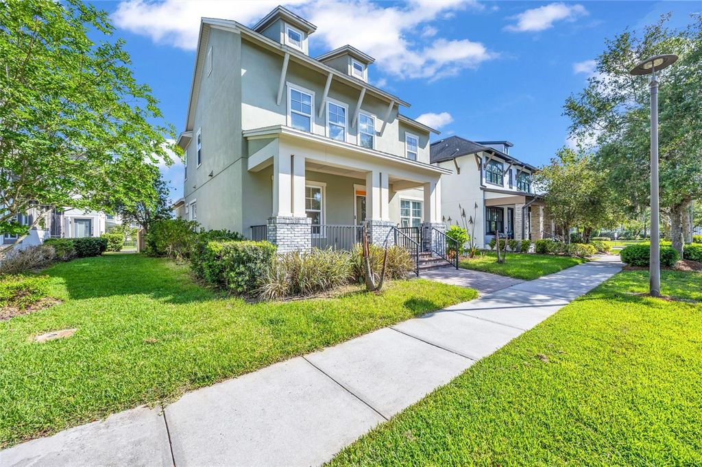 Photo of 8636 Tavistock Lakes Boulevard, Orlando, FL 32827 (MLS # R4911134)