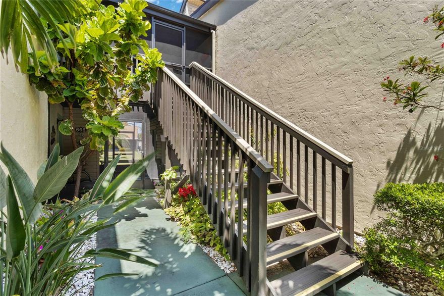 Winding tree-lined roads lead to Sea Grape Villas, where this FIRST FLOOR, CORNER UNIT sits on a preferred cul-de-sac. A covered, screened-in lanai offers a private entrance with seating, access to the backyard, and a separate laundry room.
Inside, you'll notice the NEW flooring and light fixtures. The open layout connects a REMODELED white & bright kitchen with updated countertops, a large sink, and generous storage that leads into the dining area. Sliding glass doors in the dining room open to a shaded garden with bench seating.
Just beyond is the living room and sunroom, both filled with natural light and open views of the unobstructed, private backyard green space and Florida sunsets.
The primary bedroom features a walk-in closet, an UPDATED en-suite bathroom, and sliding glass doors with plantation shutters. The guest bedroom also features sliding shutters, a private bathroom. BOTH bedrooms share access to a fenced-in zen courtyard, ideal for morning coffee or relaxation. FURNISHINGS OPTIONAL. 
Bird Bay Village is a pet-friendly & active community with access to trails, pickleball, tennis, a lap pool, multiple gyms, shuffleboard, and a clubhouse with activities and events. The legacy Trail is just a block away and is a neighborhood favorite. 
Major shopping like HomeGoods & PetSupermarket, award-winning restaurants, beauty boutiques, banking, and more are located just outside of the neighborhood entrances.
Venice Island is conveniently located less than two miles away, providing the Venice Theater, Art Center, Venice Beach, Marina, golfing, Yacht Club, Jetty, Dog Beach, Fishing Pier, airport, parks, playgrounds, and cultural venues. 
The Bird Bay Village community is welcoming and has something for everyone! This unit is priced competitively. Contact your Realtor® for more information and to schedule your private tour today!