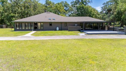 Photo of 830 NW 111th Lane, Oxford, FL 34484 (MLS # S5150375)