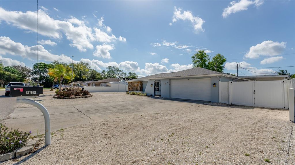 Photo of 5844 Riddle Road, Holiday, FL 34690 (MLS # TB8487412)