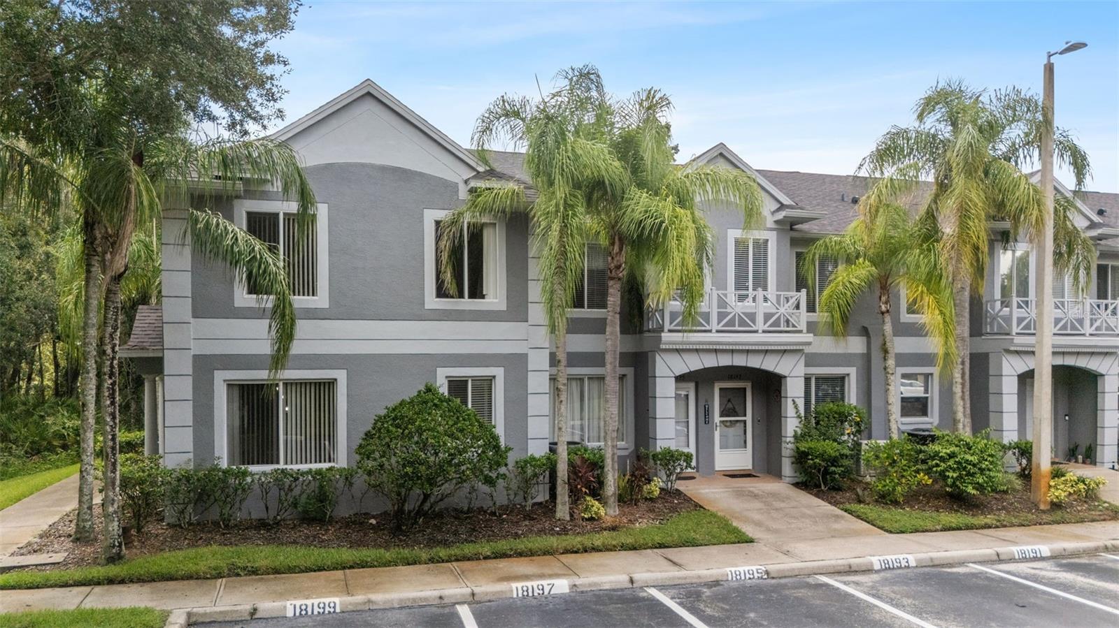 Welcome to this beautifully maintained two-story townhome in the gated community of Heritage Isles Golf and Country Club. This charming residence offers 2 bedrooms and 2 full bathrooms upstairs, with a spacious and inviting living area plus a half bath on the main floor.
Enjoy peaceful conservation views from both the screened-in lanai downstairs and the private screened balcony off the master suite, which features elegant wood-plank flooring. The first floor boasts upgraded wood laminate flooring throughout, with tile in all wet areas.
The gourmet kitchen features stunning granite countertops, a breakfast bar, stainless steel appliances including a refrigerator, microwave, flat-top electric range, and dishwasher. A custom-built storage area under the stairs for added functionality. The flexible second living space is currently used as a spacious dining room, perfect for entertaining and seamlessly connecting to the screened lanai.
Upstairs, the large master suite offers a generous walk-in closet and serene conservation views. The second bedroom includes two connected closets and easy access to the hallway bath. The laundry closet is conveniently located in the upstairs hallway.
Enjoy extra privacy with no immediate neighbors in front or behind the home.
Heritage Isles is a true resort-style community offering incredible amenities: a full-service restaurant, fitness center, expansive pool with a two-story water slide, golf course, pro shop, tennis and basketball courts, and a playground.
Conveniently located with easy access to I-75 via Morris Bridge Rd or Bruce B. Downs Blvd. Close to USF, Wiregrass Mall, Advent Health and Bay Care Hospitals, and a short drive to Tampa International Airport.
Don’t miss the opportunity to own this exceptionally clean and well-cared-for home—schedule your private showing today!