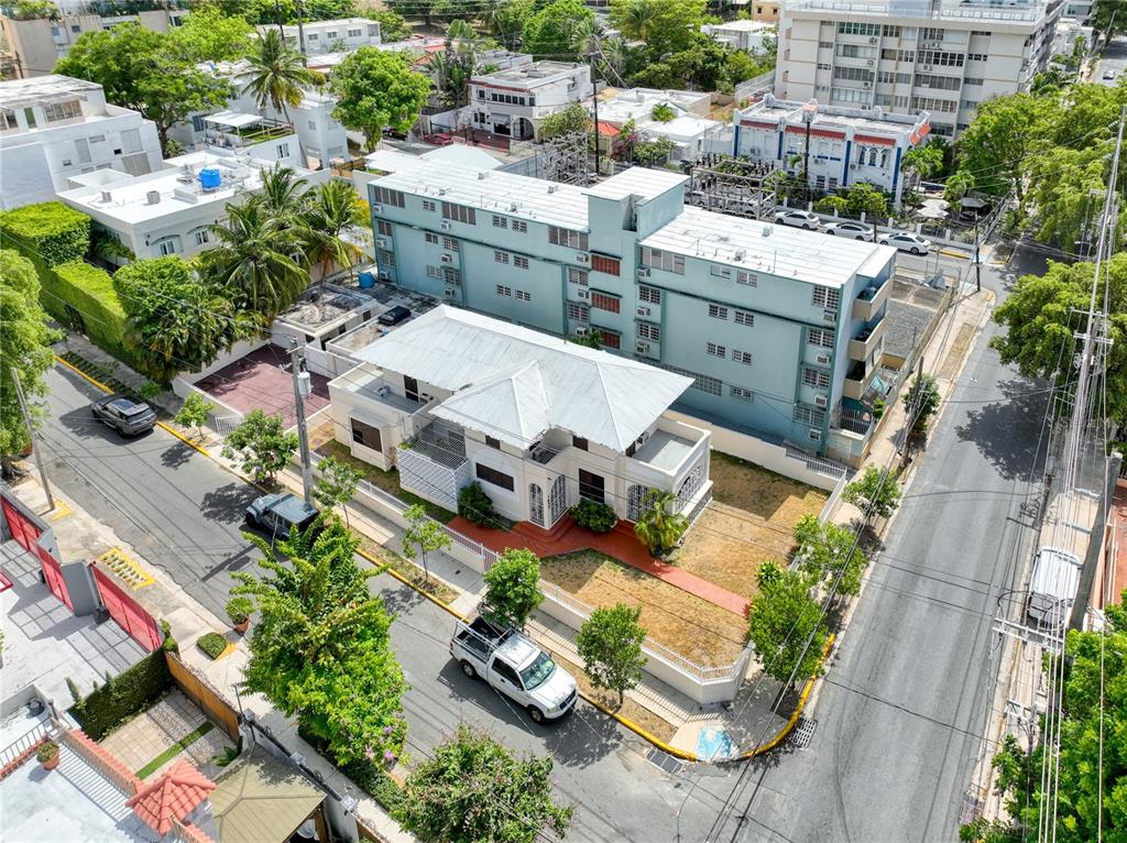 A legacy property with a rich history and impressive front facing appeal, 1430 Wilson Street is located just 2 blocks south from Ashford Avenue and Condado Beach's town center. Combined, this property represents 2 continuous homesites measuring approximately 578 sq.m off flat land, offering the owner easy to build, re-imagine or re-invigorate with a historic tribute to mid century colonial architecture.
A corner site, with entry from and sitting on the crossroad of Wilson and Washington Street, this location fuels the heart of the vibrant CoBe district, with strategically centric access to the district's fully walkable/ biking lifestyle. 1430 Wilson undeniably holds one of the most enviable addresses in Condado Beach.
Surrounded by a magnificent culinary scene, cultural hubs, hospitals, shopping, beaches and located just a five minute walk to St. John’s and Robinson, two of the most prestigious educational institutions in Puerto Rico make this the ultimate location to re-design the ideal in-city architecturally significant estate or reimagined second life as the future destination of a sustainable and wellness focused residential project.