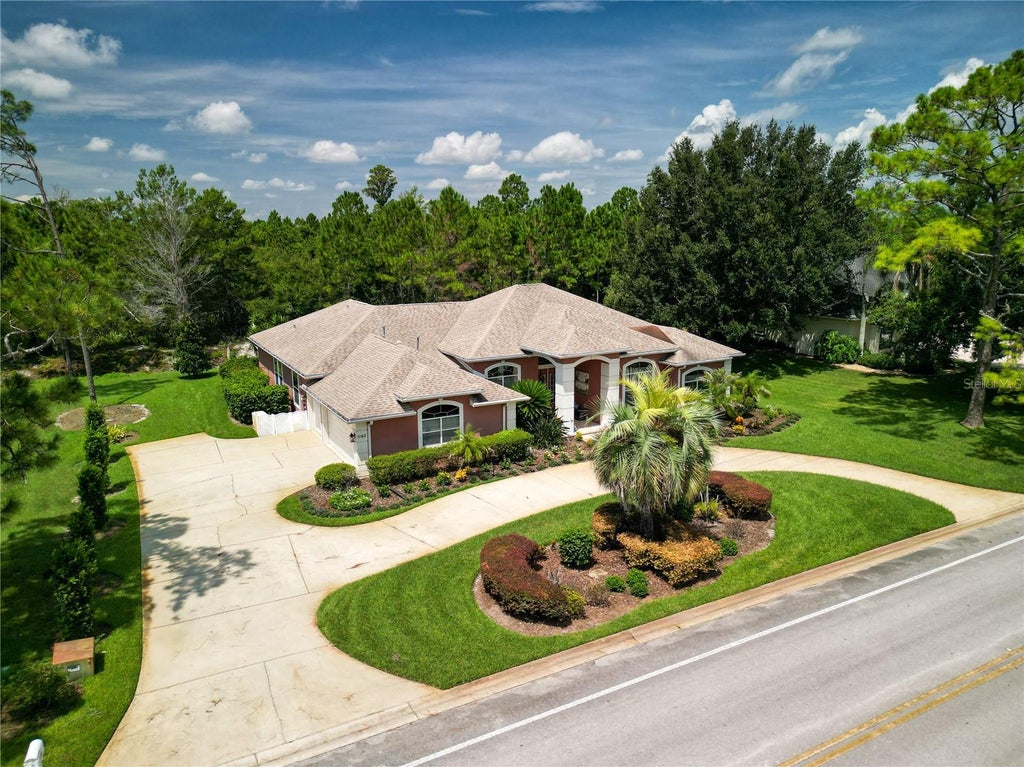 Photo of 1162 Club House Boulevard, New Smyrna Beach, FL 32168 (MLS # NS1089112)