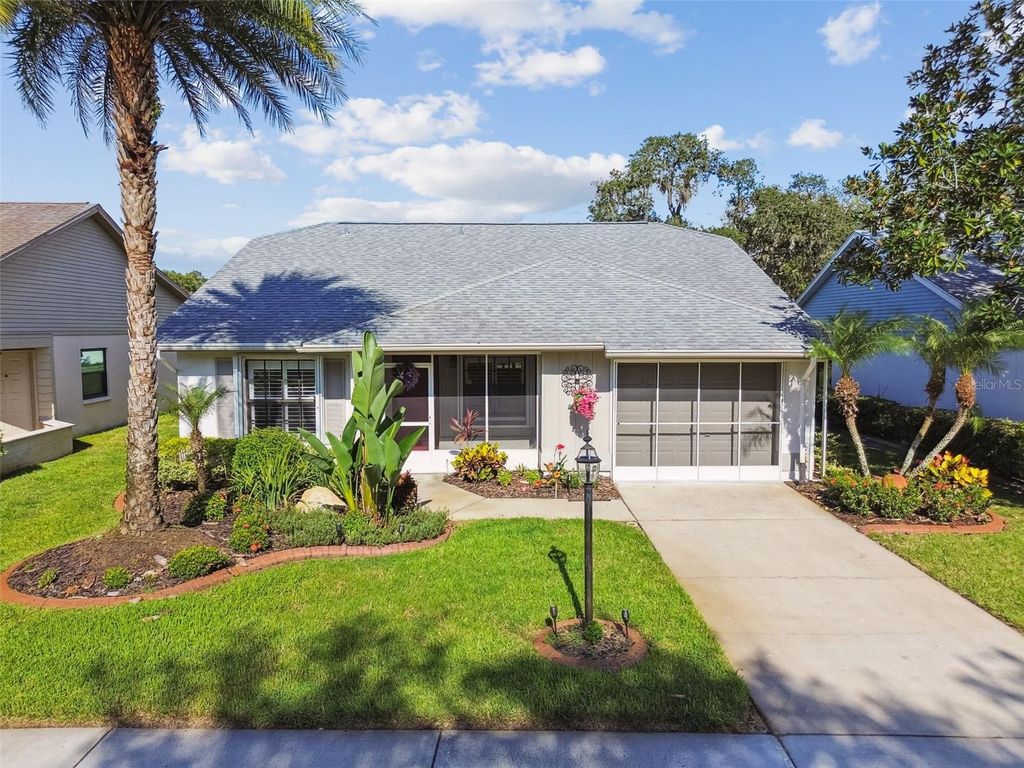Photo of 11604 Pear Tree Drive, New Port Richey, FL 34654 (MLS # TB8429719)