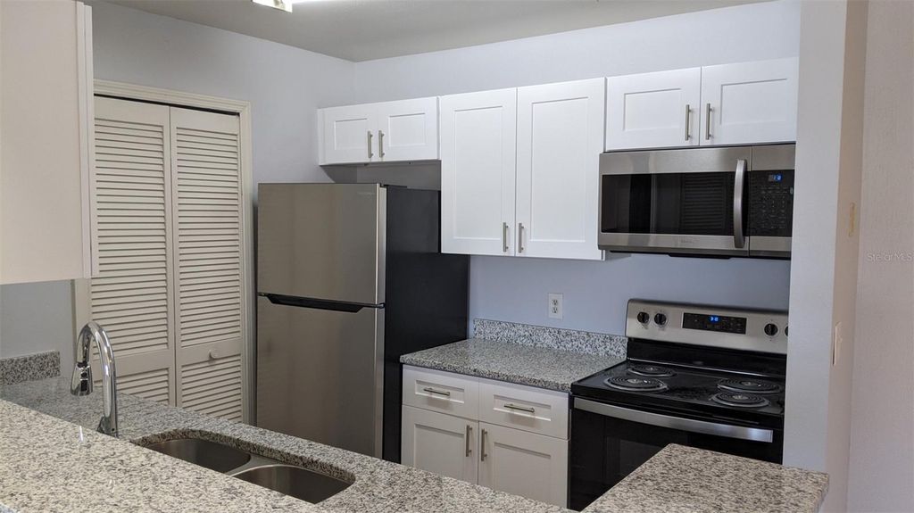 Photo of 6190 Westgate Drive #303, Orlando, FL 32835 (MLS # O6408251)