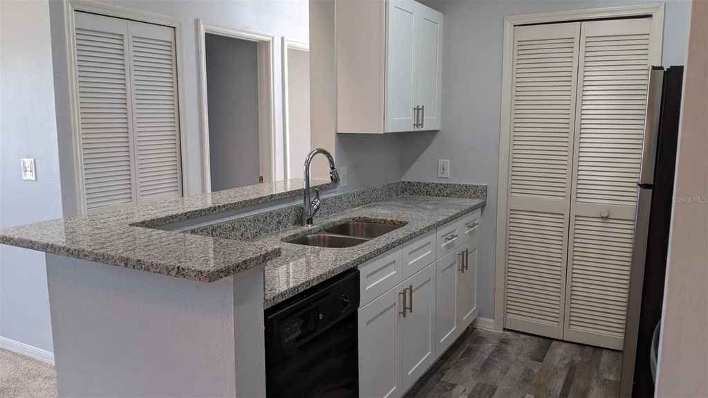 Photo of 6190 Westgate Drive #303, Orlando, FL 32835 (MLS # O6408251)