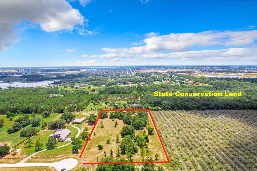 Discover 5.1 beautiful acres in Avalon Hills, an exclusive community featuring just 16 premium luxury home 5 acre lots. No need to move almost an hour away just to find some land and more privacy when this gem is minutes to Windermere and everywhere you want to be.  This vacant land represents the essence of premium real estate, nestled at the end of a one-way street ending in a serene cul-de-sac bordered by State conservation land that will never be developed. Imagine crafting your dream home on the premier lot, perched on a gentle hill overlooking the entire neighborhood. The elevation advantage allows for breathtaking sunset views that you can relish right from your front door. Numerous mature oak trees throughout the property offer splendid options for integrating them into your home's design. While maintaining the tranquil country atmosphere, you'll still enjoy all the advantages of a Winter Garden zip code while paying Lake County taxes and still be minutes to Windermere and surrounding areas. Nearby luxury estates ensure your new home will fit seamlessly into this elegant neighborhood. It gets better, you will have the freedom to choose any builder you prefer. Minutes to Windermere, Hamlin, Winter Garden Village, and the 429 Expressway to Disney, Downtown Orlando, and all major shopping, restaurants, and attractions.  This lot is truly a rare find, as there's nothing quite like it currently on the market. Don't miss this chance to own your piece of paradise! all measurements and zoning restrictions to be verified by the buyer/ buyers agent.