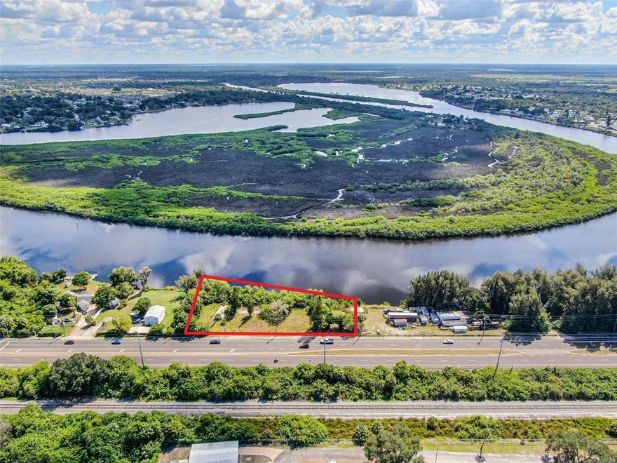 Little Manatee River Commercial Vacant Lot ready for development. Located near Tampa South RV Park and Southern Hillsborough County Park on navigable water; east side of Highway 41 (4-Lane divided Highway); about seven miles north of Port Manatee.