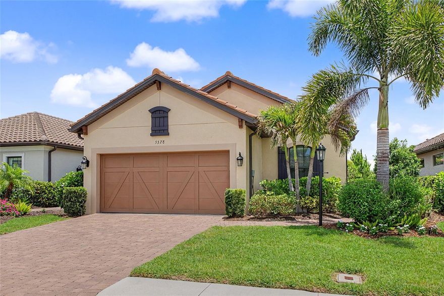 This stunning newly painted exterior Arezzo model is beautifully landscaped and located in Esplanade on Palmer Ranch - Sarasota’s premier gated resort-style community. This property, located on a quiet cull-de-sac street,  is being offered TURNKEY, FULLY FURNISHED featuring over $75,000 in premium upgrades. The home features a light and airy open concept design with 3 bedrooms, 2 bathrooms plus a den. Bordering a nature reserve, making for exceptional privacy and peaceful views. Key enhancements include 10’ ceilings, 8’ solid wood interior doors and a garage with 4’ extension and acrylic flooring. The natural gas kitchen features an abundance of cabinetry, work space, quartz counter tops and pantry plus flows seamlessly into the living and dining area. The primary suite serves as a welcome retreat featuring a bathroom with dual vanities and spacious walk-in closet. The second bedroom opens to the hall bath creating an on-suite for guests. Premium upgrades include: Luxury waterproof vinyl flooring in bedrooms and den installed 2025, plantations shutters and custom window treatments, whole house GENERAC generator and CULLIGAN water filtration system, extended screened lanai with a natural gas grill and pizza oven, new washer and gas dryer 2025, ceiling fans throughout, tray ceilings, upgraded exterior elevation and new exterior paint in 2025 and tile roof just cleaned! Esplanade on Palmer Ranch and Legacy Estates offer an active carefree living with world class amenities including an on-site Bahama Bar restaurant and bar with entertainment, resort-style pool, resistance pool, splash park, hot tub and covered lanai with fireplace. Plus a wellness room for massages, state of the art fitness center with daily classes and stretching room, 8 pickleball and 2 tennis courts, plus 3 dog parks. Residents also enjoy 2 direct gates access to the legacy Trail. Added bonus is lawn care including mowing, Irrigation, trimming and mulching! Convenient location within easy reach of Siesta Key Beach, downtown Sarasota, downtown Venice and local beaches. Convenience continues with quick access to major roads, restaurants and shopping including UTC.  Isn’t it time to start living the Florida Lifestyle?