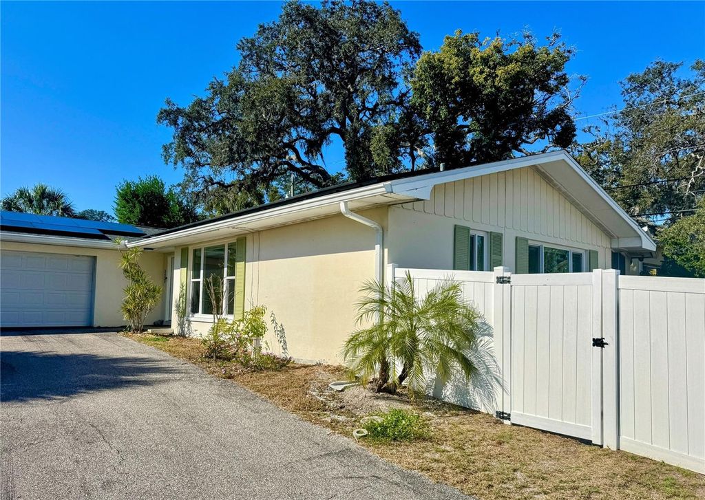 Photo of 3425 High Bluff Drive, Largo, FL 33770 (MLS # TB8437114)