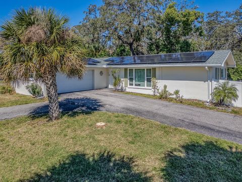 Photo of 3425 High Bluff Drive, Largo, FL 33770 (MLS # TB8437114)
