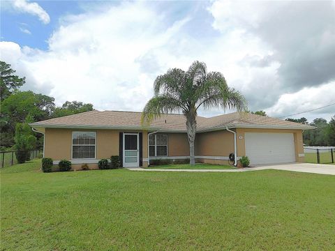 Photo of 206 Locust Pass Lane, Ocala, FL 34472 (MLS # OM710709)