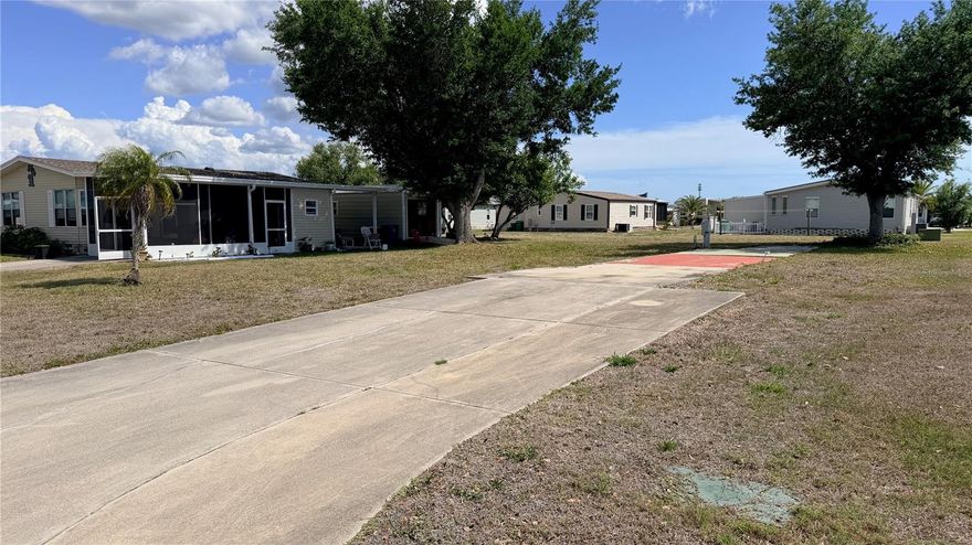 Opportunity in Lemon Bay Isles, the same sought-after 55+ community as Buttonquail. This homesite previously had a residence that sustained storm-related damage during a rare weather event. The property did not experience flooding, and the lot now presents a clean slate for a new manufactured home.

This is an ideal setup for buyers looking to place a NEW MANUFACTURED HOME in an established neighborhood with existing infrastructure already in place. Public WATER and SEWER are available, paved streets, and a level lot make rebuilding straightforward. Whether you are planning a seasonal retreat, full-time residence, or investment, this property offers flexibility in a community where land ownership matters.

Unlike many manufactured home communities, there is NO LOT RENT. Ownership is FEE SIMPLE with LOW HOA FEES and mandatory Lakeside Club membership that provides access to COMMUNITY POOL, TENNIS, SOCIAL ACTIVITIES, and RECREATION. Golf carts are welcome and the neighborhood is known for its friendly atmosphere and walkable layout. 

Located just minutes from shopping, dining, medical facilities, and a short drive to GULF BEACHES, this property offers the chance to build new while enjoying an established 55+ community.