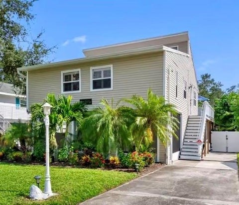 Photo of 313 Crystal Beach Avenue, Crystal Beach, FL 34681 (MLS # O6409459)