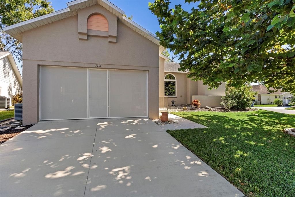 Photo of 7312 Bottle Brush Drive, Spring Hill, FL 34606 (MLS # W7880583)