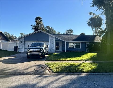 Photo of 965 Sandle Wood Drive, Port Orange, FL 32127 (MLS # O6360831)