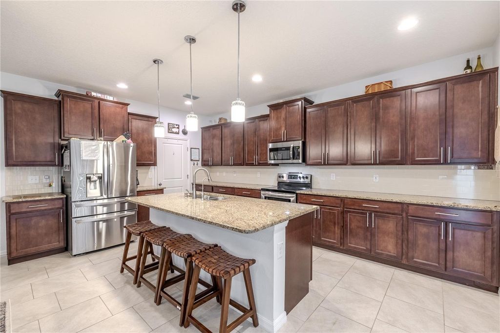 Photo of 1089 Montgomery Bell Road, Wesley Chapel, FL 33543 (MLS # TB8433866)