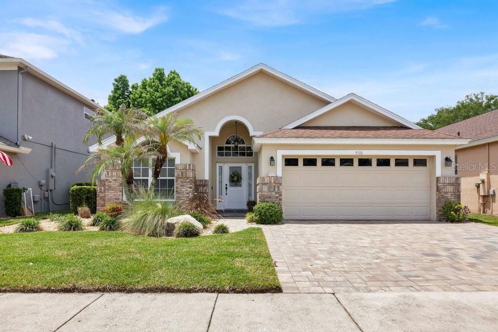 Photo of 9506 Pecky Cypress Way, Orlando, FL 32836 (MLS # O6404360)