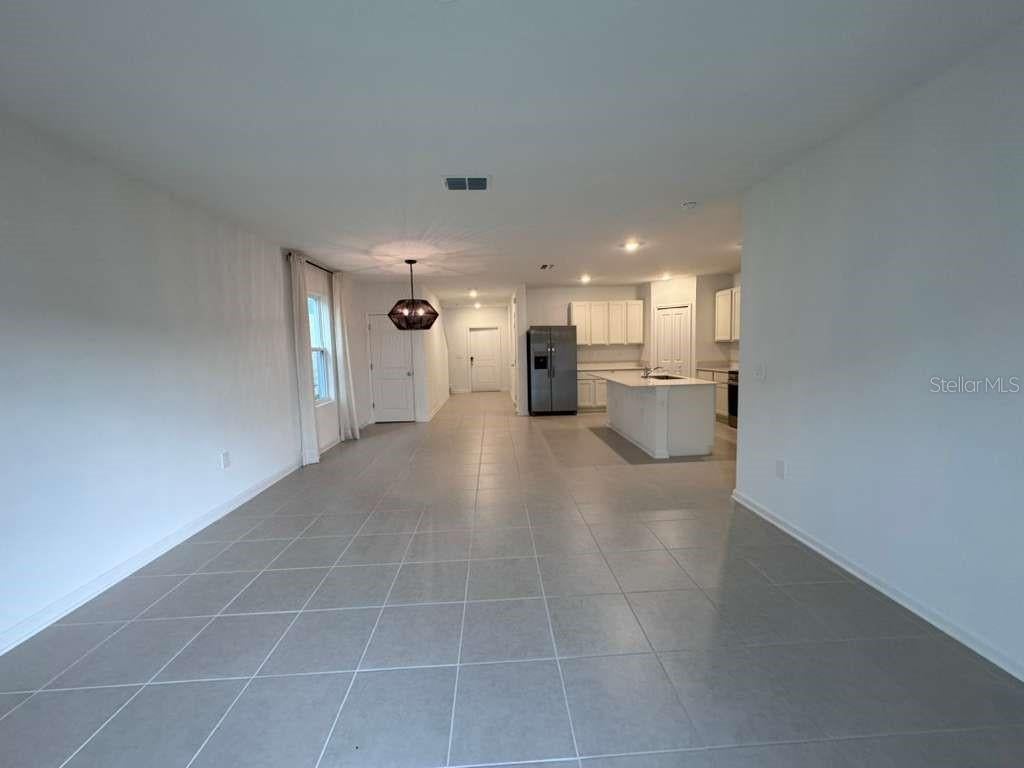 Photo of 5031 Oaks River Street, Davenport, FL 33837 (MLS # O6437902)