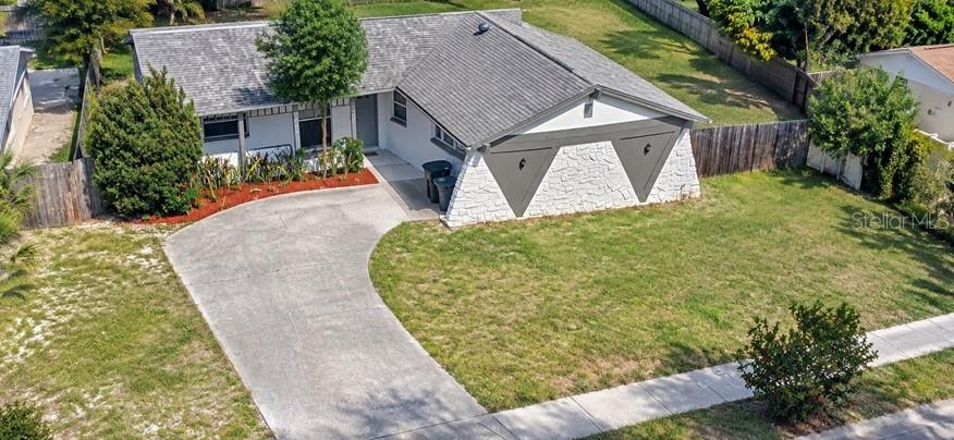 Photo of 1019 Peninsula Road, Tarpon Springs, FL 34689 (MLS # W7887046)