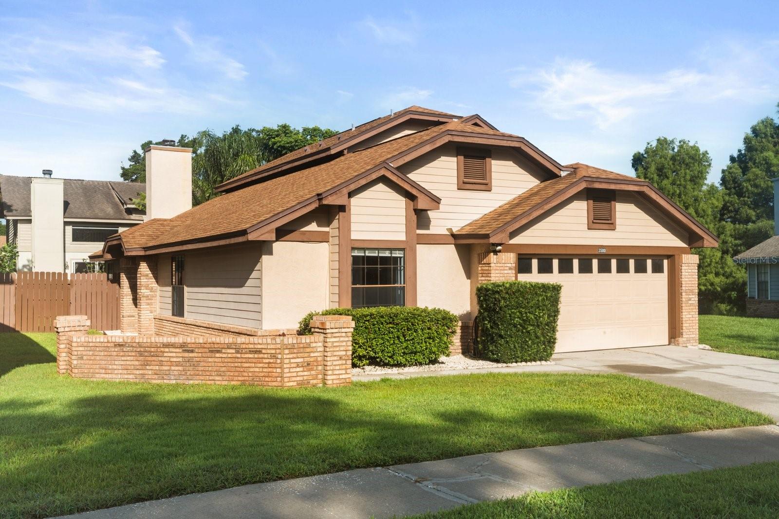 Magnificent and spacious 3 bedroom, 2 bathroom, 2 story home located in the beautiful Bryn Mawr neighborhood. This HOA community offers amenities including a clubhouse, pool, playground and tennis courts, sidewalks throughout for outdoor enjoyment. Upon entering, the sun-drenched living room with vaulted ceilings and elegant eye-catching brick wood-burning fireplace with open floorplan to the dining room draws you in with a sense of serenity. The recently renovated kitchen is bright and inviting with soft close cabinets, stainless steel appliances and quartz countertops. There is plenty of space for preparing fantastic meals to enjoy either in the adjacent dining room or the bonus room area. The bonus room area can be used as you wish, perhaps as a eating nook, additional entertainment space, play / game area, and more. The secondary bedrooms with large closets and ceiling fans, as well as natural lighting and are located on the main floor. Down the hall from the two bedrooms is the second full bathroom which is also updated. Next to the bathroom is the generously sized laundry room with a storage closet. As you proceed up the lovely espresso stained wood stairs to access the primary bedroom, you will be pleasantly surprised with the oversized en-suite bedroom with views of Lake Farrar through the multiple windows providing amazing natural lighting. The primary bedroom also offers the convenience and cost saving amenity by having its own mini-split AC / Heat. The en-suite bathroom has two closets including a walk-in, dual sinks with extra long counterspace, garden soaking tub with a large window for extra lighting, and a separate shower. The upstairs is fully comprised of the primary suite. Make your way downstairs and head outside to the fully fenced backyard where you will find a concrete porch perfect for a cookout, relaxing under the stars, and plenty of yard space to create your own paradise. Conveniently located within minutes of shops, restaurants, highways and airports and very close to the schools. Schedule an appointment to view this meticulously maintained property!
