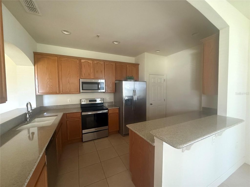 Photo of 2970 Ashland Lane S, Kissimmee, FL 34741 (MLS # O6399619)