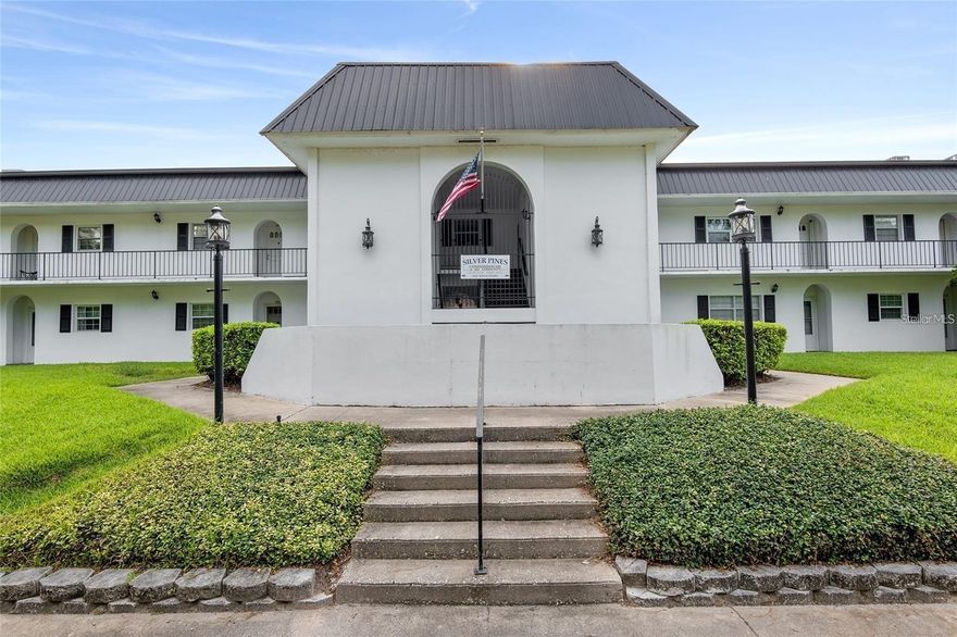 Wonderful 1/1 condo in a great NE Ocala location. The 55+ Silver Pines Condominiums features a large pool with a covered outdoor entertainment area perfect for friends and family. This condo has been fully renovated. There is a larger living room / dining room combo area with a pass-thru from the kitchen to the living room. The kitchen features quartz countertops, wood cabinets with ample storage space. The bedroom has a large closet with built-in vanity and built-in storage with a connected walk-in closet with cedar ceiling. There is also French Doors that lead out the screened-in balcony overlooking the pool area. The building has an elevator for easy access to the second floor. There is assigned covered parking and plenty of visitor parking. The HOA Fee also includes Trash, Water, Insurance, Common Area Taxes, Painting, Maintenance and Repair (exterior building only). Residents enjoy exclusive access to community amenities such as a swimming pool, sundeck, cabana, outdoor grill, outdoor showers, and laundry facilities. Across the street, a serene park invites you to unwind with scenic walking trails and a fitness station. Perfect for reconnecting with nature right outside your doorstep. Less than a mile to world famous Silver Springs State Park with kayaking, glass bottom boats and nature trails. This condo is close to everything Ocala has to offer. Must see!