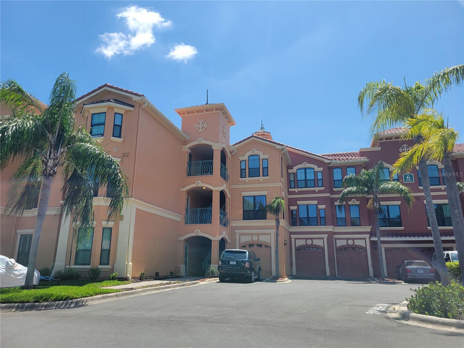 Step into designer luxury in this impeccably styled 1-bedroom plus office/guest room condo, located in the exclusive gated waterfront community of The Grand Bellagio in Clearwater. Every detail has been thoughtfully curated, with high-end finishes, elegant lighting, and sophisticated design elements throughout. The gourmet kitchen is a true centerpiece, showcasing stainless steel appliances, granite countertops, and refined craftsmanship that elevates everyday living. The spacious primary suite offers a serene retreat with a custom-built closet and a spa-inspired bath featuring a seamless glass shower and pebble stone flooring. An enclosed den provides the perfect flexible space for a chic home office or inviting guest room, while crown molding and a striking stone fireplace create warmth and character in the main living area. Residents enjoy a world-class lifestyle with resort-style amenities, including a waterfront promenade, pool, spa, sauna, tennis courts, fitness center, clubhouse, and 24-hour guarded entry. Ideally situated just minutes from the world-famous Clearwater beaches, premier shopping and dining, and with quick access to Tampa and St. Pete airports, this residence blends luxury, comfort, and convenience—making every day feel like a getaway.