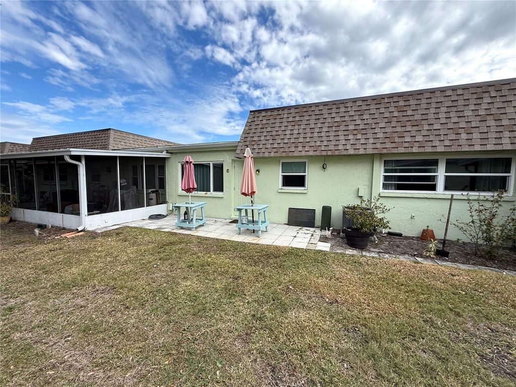 Photo of 8472 Deauville N #8472, Pinellas Park, FL 33781 (MLS # TB8451031)