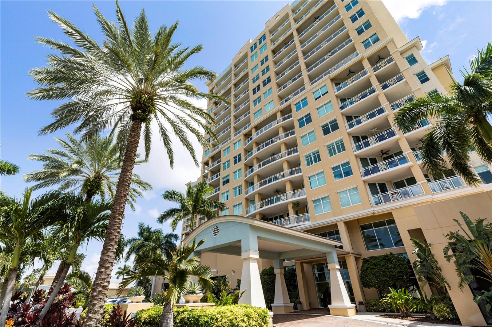 Paradise found with Resort Style Living, offering breathtaking sunsets and gorgeous panoramic views from this luxury Bel Mare Condo. This gated community features a private, secure elevator that leads directly to the foyer, and boasts stunning amenities for the ultimate Florida lifestyle! Amenities include, but are not limited to, 3 pools, 2 spa pools, a fitness center, theater room, tennis courts, and billiard & social rooms. This modern and chic unit features 2 bedrooms, 2 baths with walk-in closets, a large great room, an upscale kitchen with stainless steel appliances, granite countertops, and wood cabinets. The spacious utility room offers extra storage. Relax and enjoy amazing views from your private balcony overlooking the Manatee River. There is 2-car garage parking located under the building with secure gating. This unit is ready to move in and is conveniently located near restaurants, shopping, the beautiful Gulf Beaches, and entertainment.