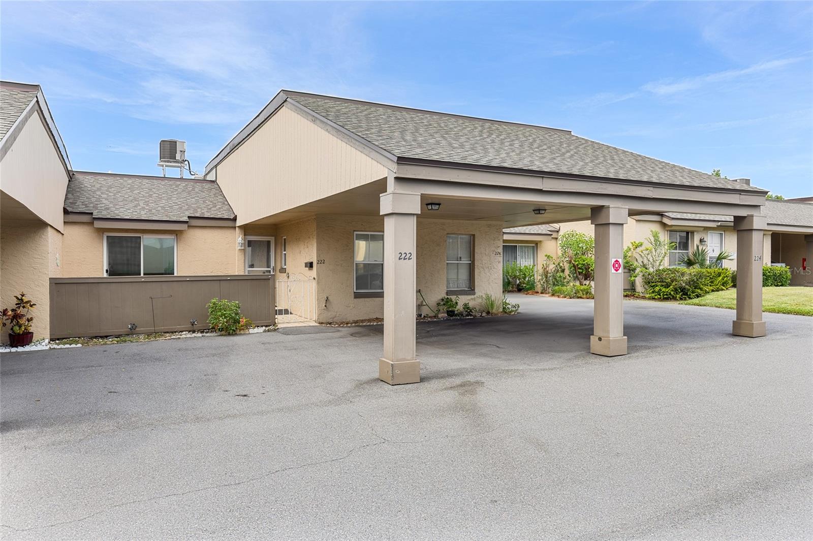 PRICED TO SELL! This beautiful 2/2 Condo Features a Fenced Front and Backyard, Private Carport with 110 Plug to charge Your Personal Scooter and an access Ramp! Walk to Publix through the private gate right in front of your condo! Convenient to Altamonte Mall, Bahama Breeze, Publix and Advent Health! Features Include: Huge Living Room/Dining Room with Built In China Cabinet, Kitchen with Granite Counters Stainless Range, Microwave and Dishwasher, 2 Bedrooms Each With A Remodeled Bathroom, Indoor Laundry with Washer & Dryer, Florida Room, Fenced Backyard with Patio, Private Carport plus an additional Assigned Parking Place. Additional Improvements: Roof 2022, Fence 2022,