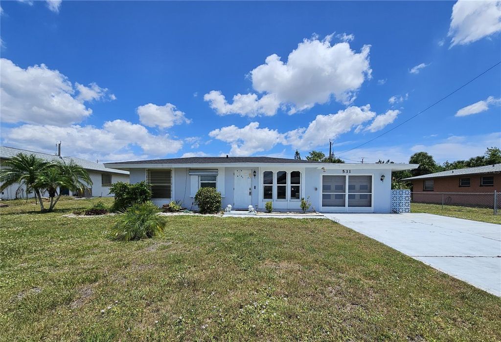 Photo of 531 Azalea Drive NW, Port Charlotte, FL 33952 (MLS # C7525559)