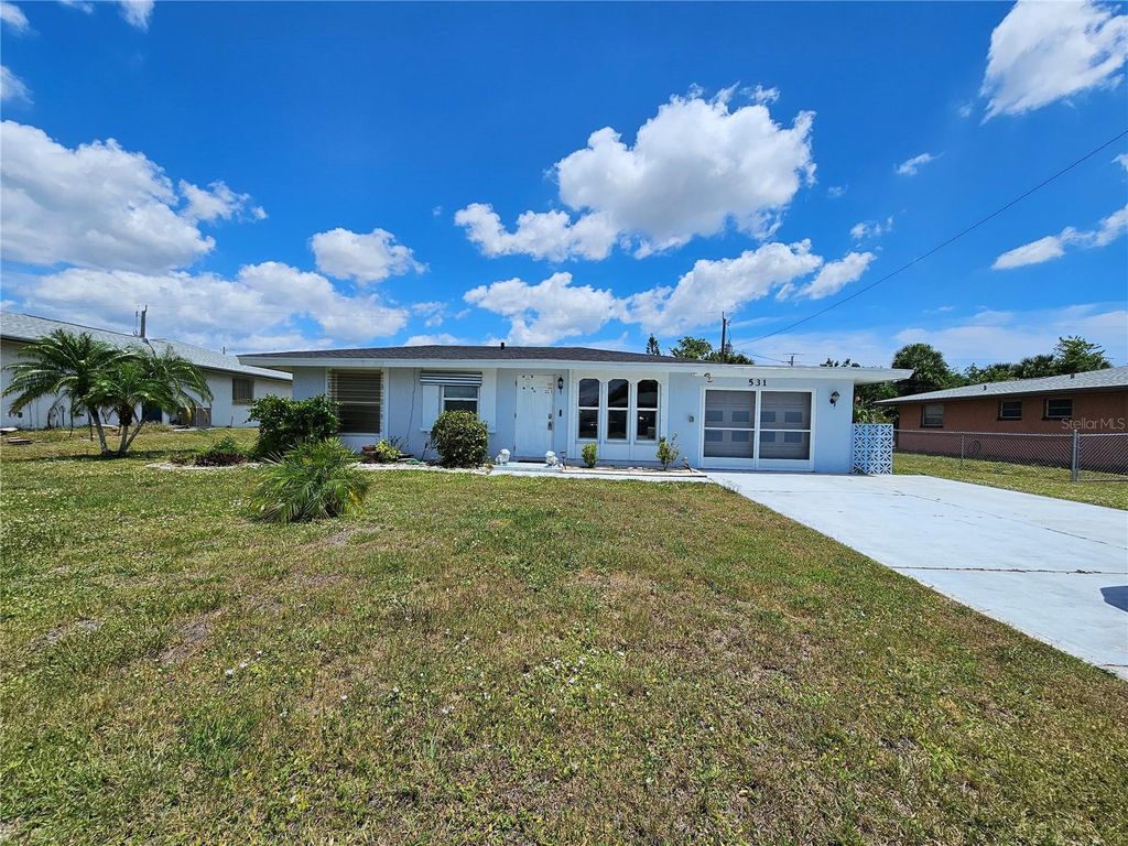 Photo of 531 Azalea Drive NW, Port Charlotte, FL 33952 (MLS # C7525559)
